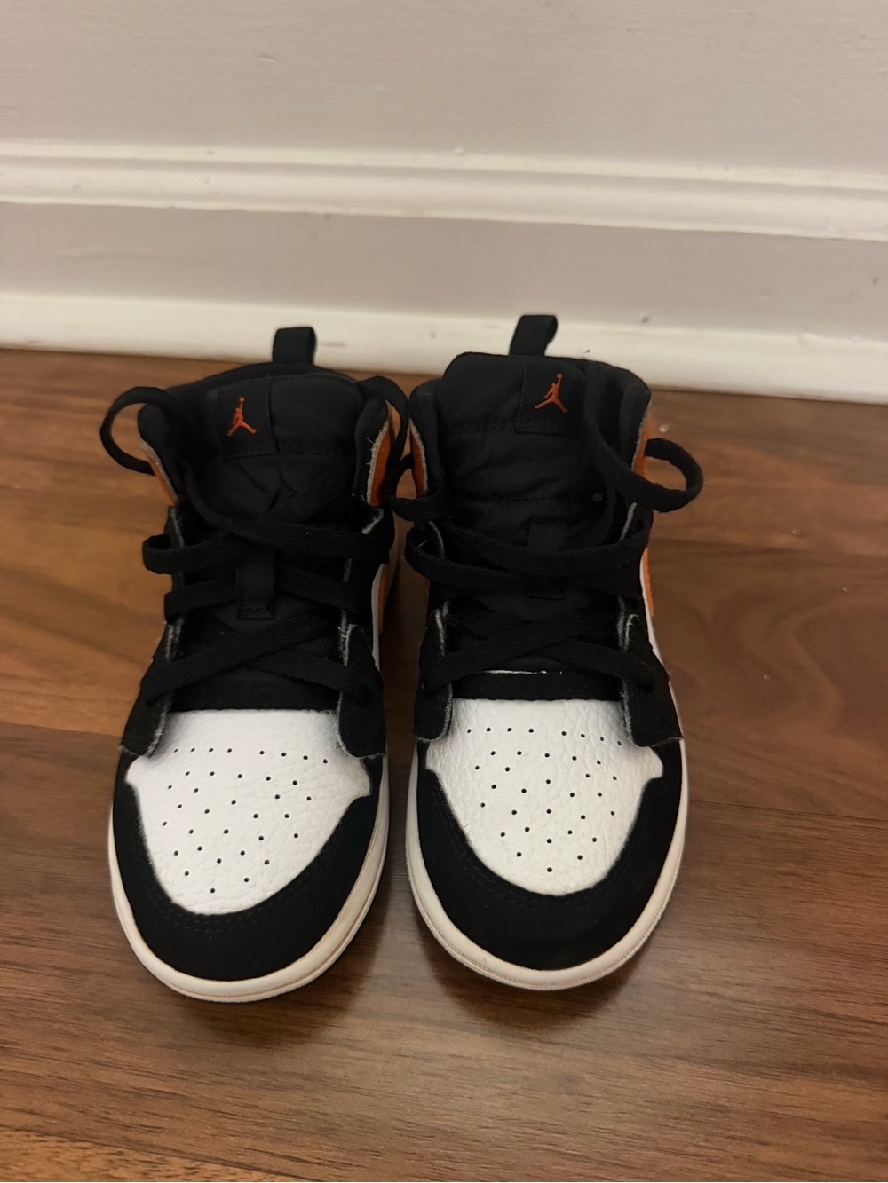 Jordan Kids High-Top Sneakers in Black & White with Orange Logo